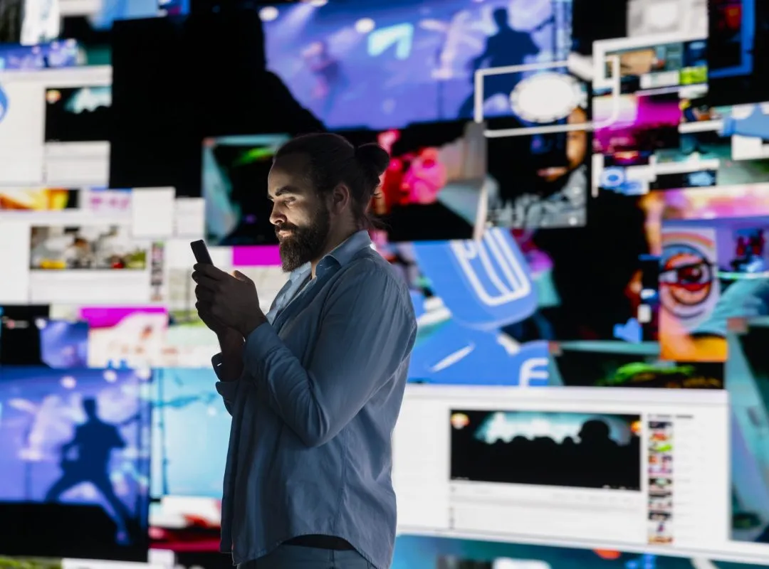 Smartphone user addicted by social media content consumption and obsessive doomscrolling that can trigger anxiety and harmful self esteem issues in the digital world. Overuse isolation.